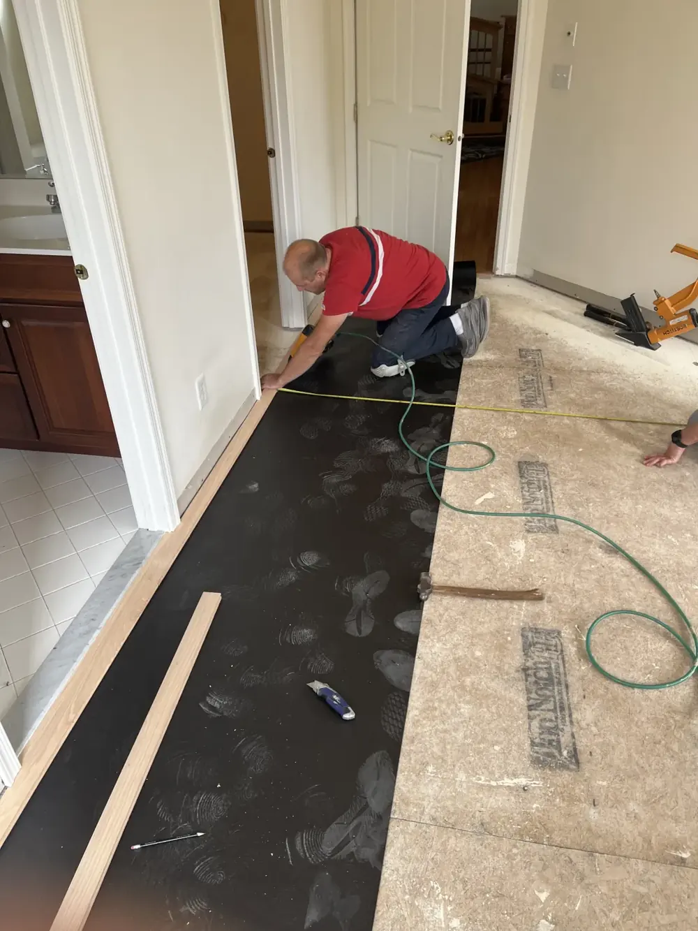 Crew laying underlayment